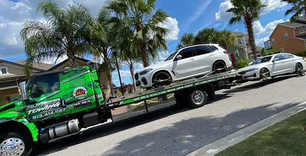 alfredo towing service in tampa with trailler