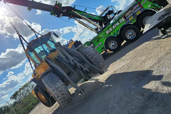 Heavy towing transport service in tampa. Image of a tractor.