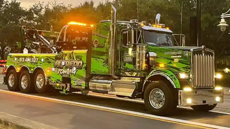 Image show a tow truck of Alfredo Towing Services. It is considered the face of the company